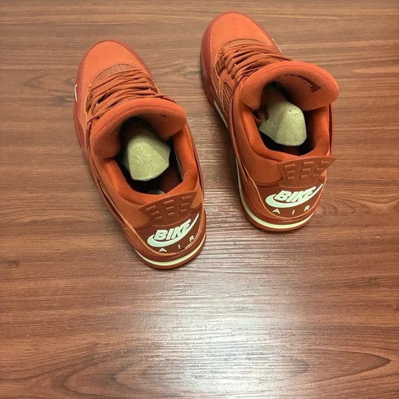 Air Jordan 4 Men's Bold
Red Sneakers - Picture 3 of 6